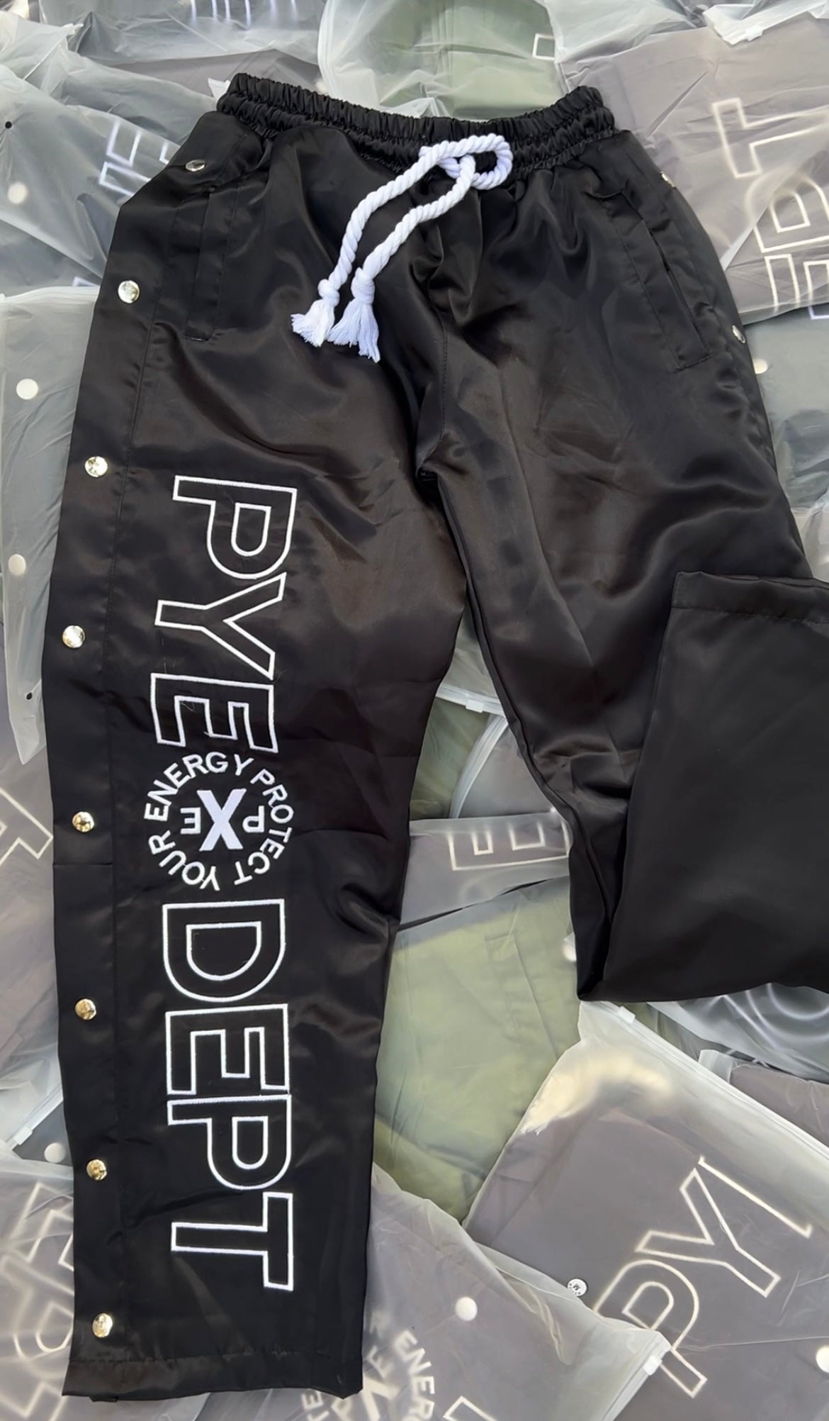 Poppin’ Buttons Track Pants