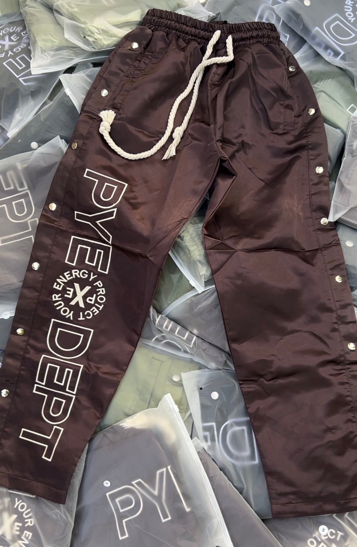 Poppin’ Buttons Track Pants